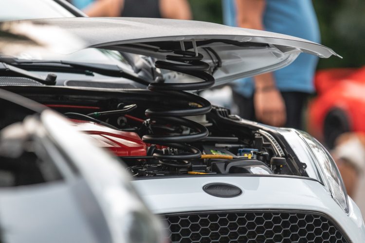 a car with an open hood