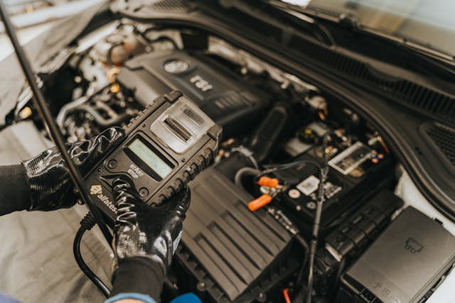 mechanic-working-with-car-engin