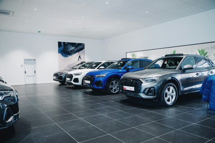 cars-are-lined-up-in-a-showroom