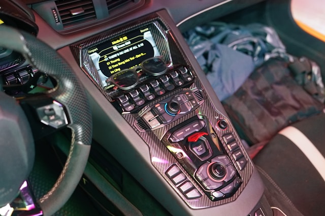 the-inside-of-a-car-with-a-steering-wheel-and-dashboard